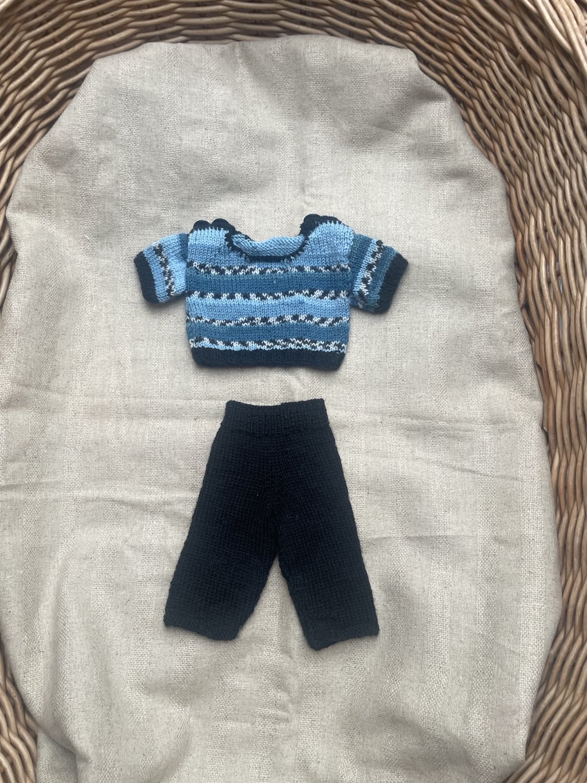 Black pants blue stripped shirt